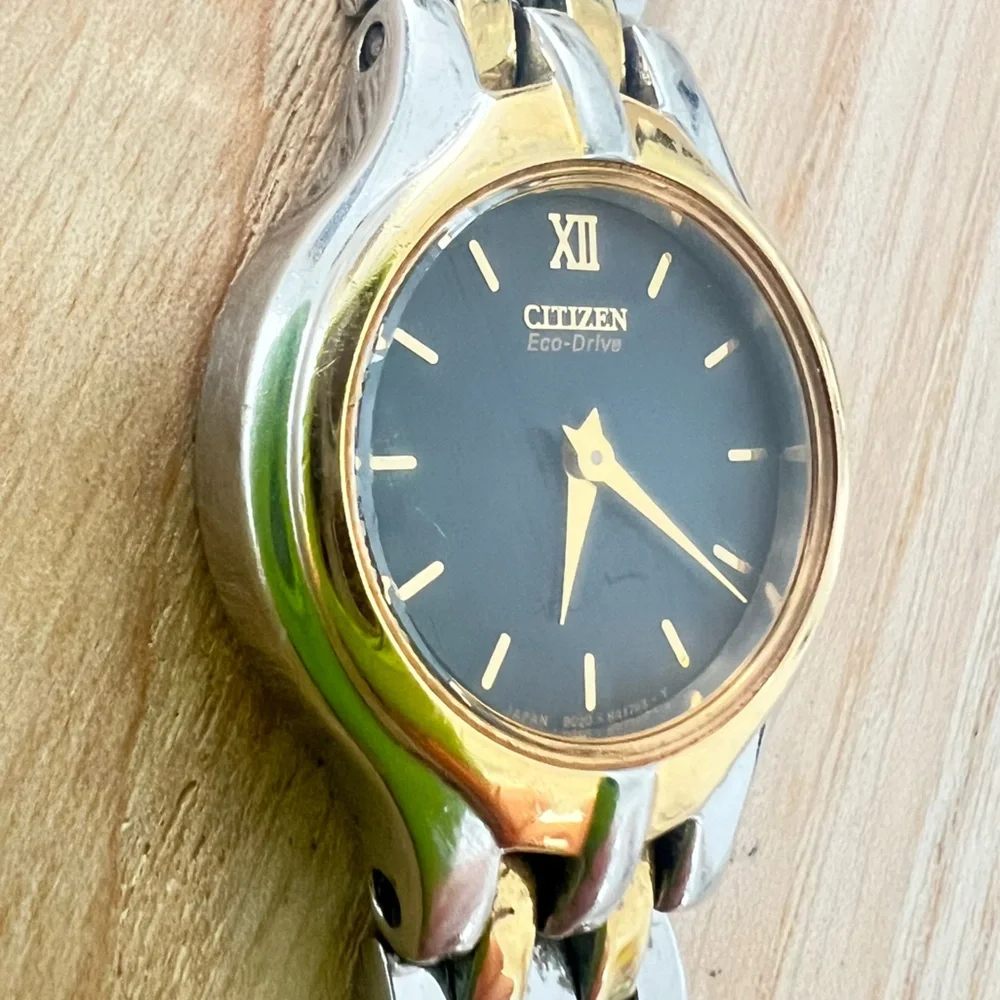 Citizen eco drive ladies black dial two tone dress solar watch